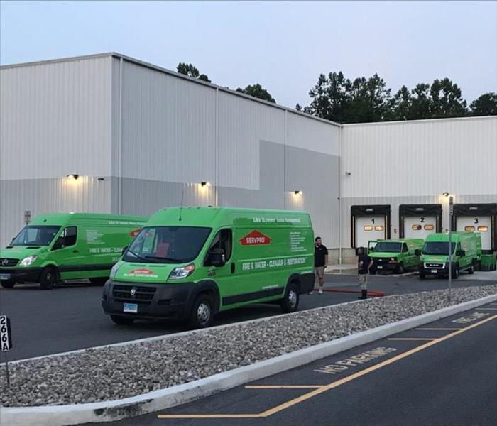 Servpro vans outside of a commercial business