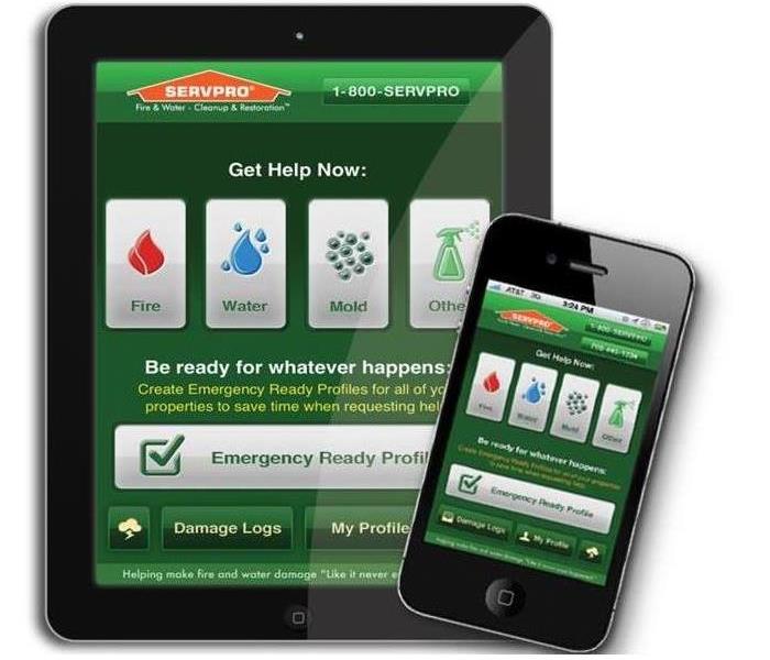 cell phone with the servpro emergency ready app on the screen