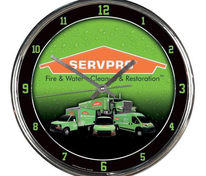 Clock with a servpro logo on it